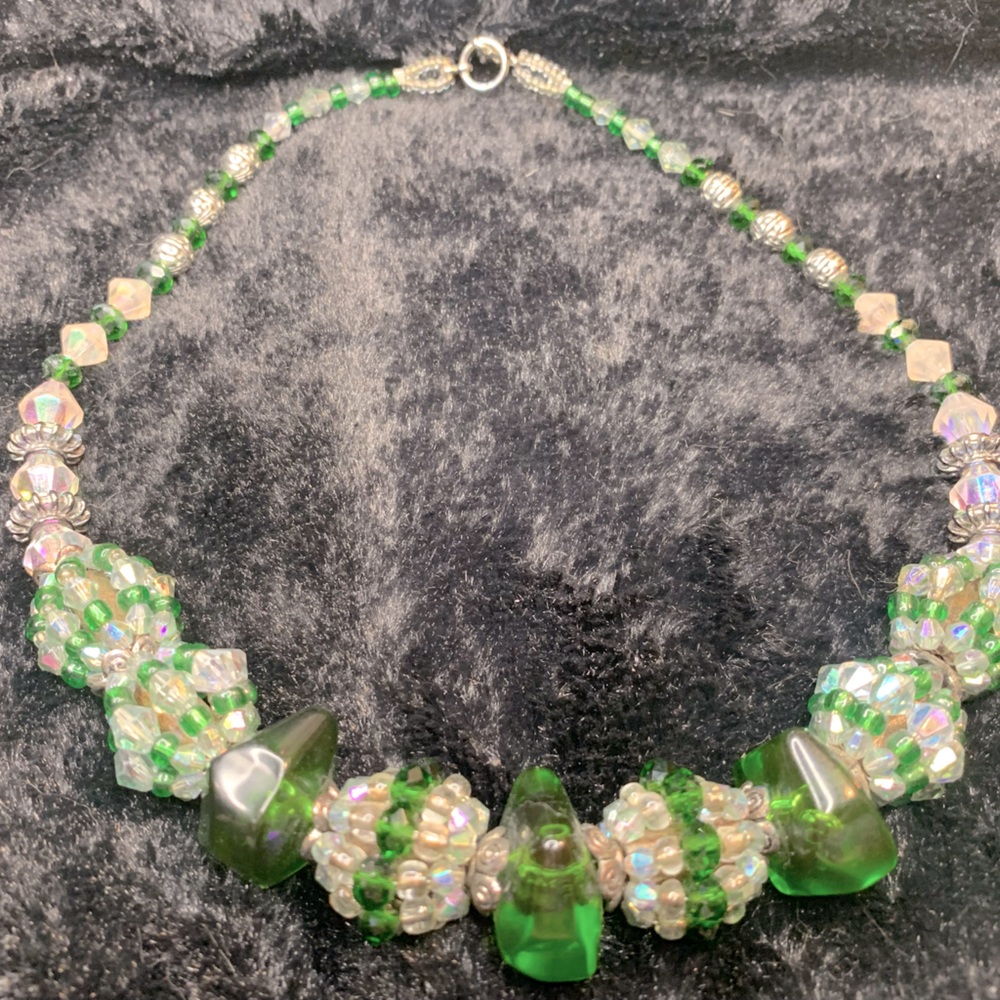 Emerald Green and Crystal colored silver tone 18” beaded necklace.